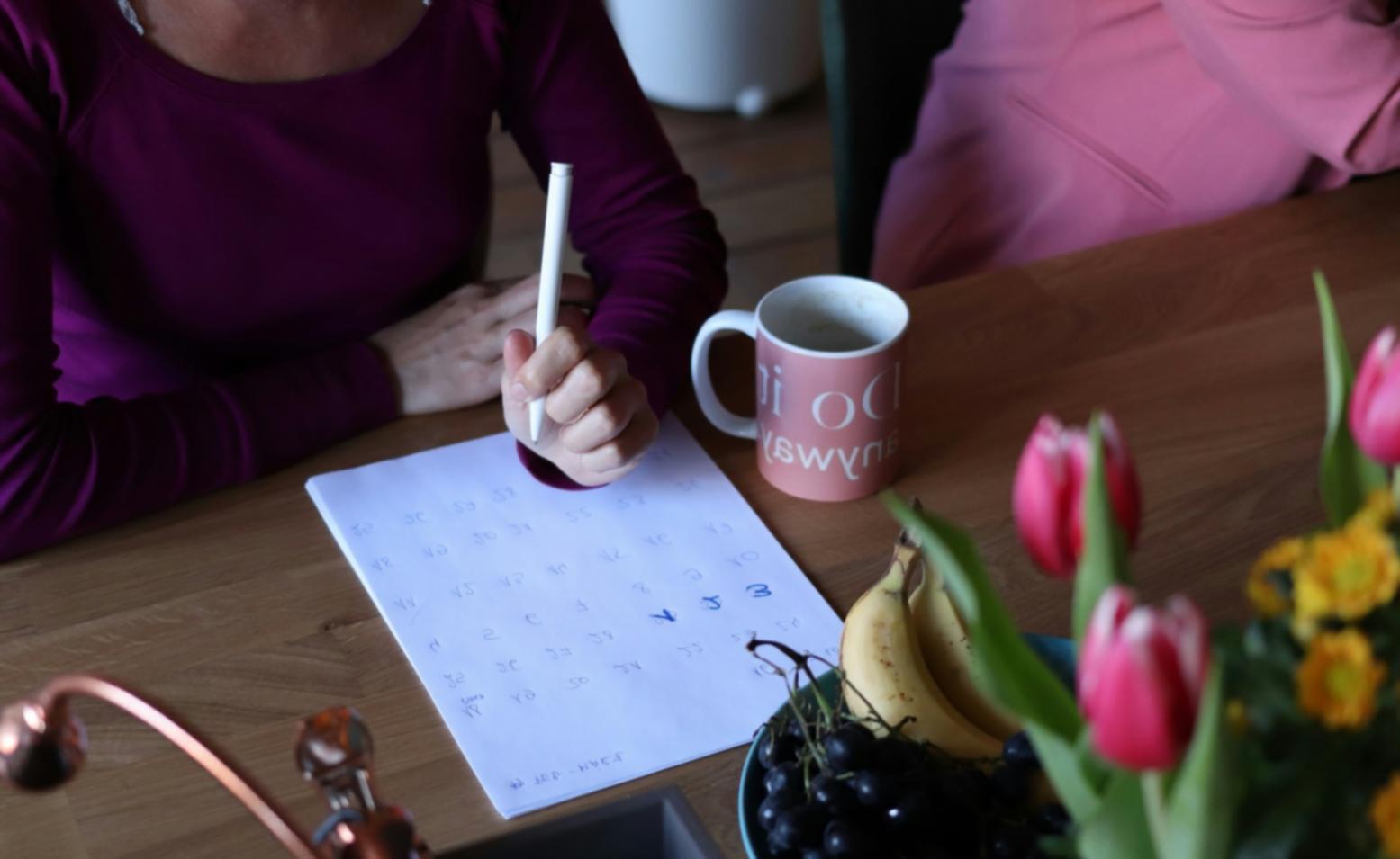 Small business owner reviewing business documents